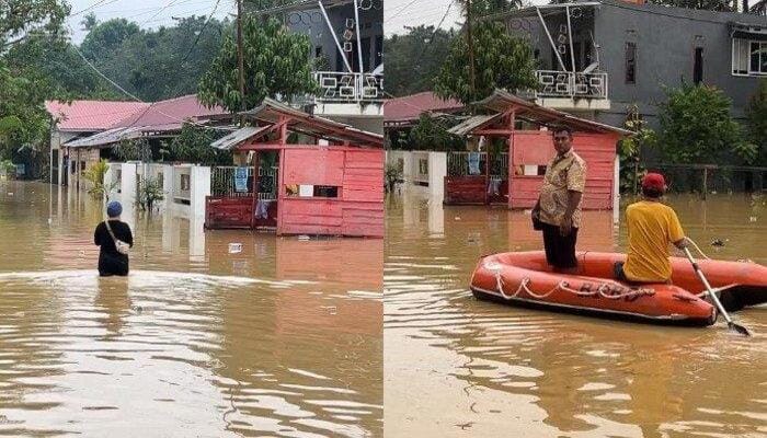 Banjir dan Tanah Longsor setinggi pinggang dan menaiki perahu karet di kawasan pemukiman yang tergenang air di Kelurahan Lepo-Lepo, Kota Kendari, Sulawesi Tenggara.